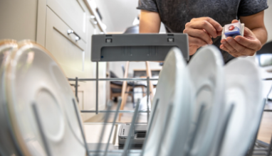 Loading dishes into a dishwasher