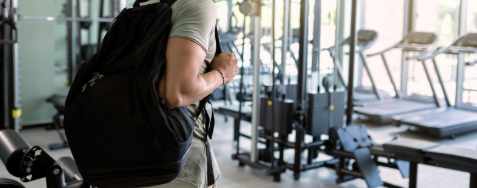 Someone carrying a gym bag ready for a workout