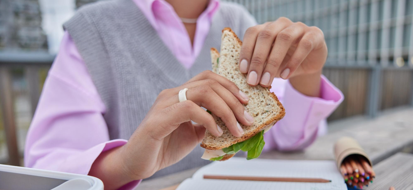 A perfectly toasted sandwich made with healthy whole grain bread, displayed appealingly.